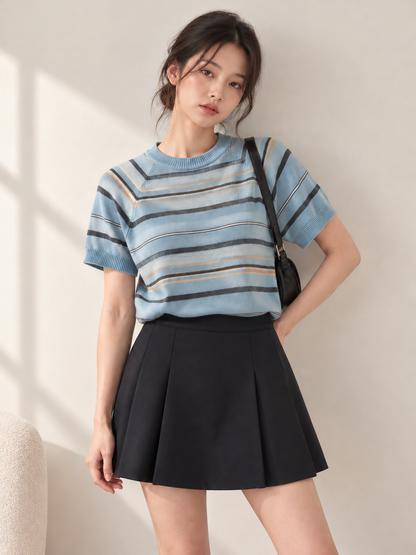 Also available in Blue - model wearing striped knit top
